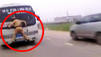 Video: Polizist 'klebt' an Windschutzscheibe