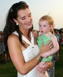 Mütter Kinder schleppen tragen Sport Heidi Klum Angelina Jolie